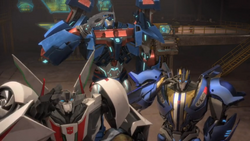 Ultra Magnus, Wheeljack and Smokescreen.png