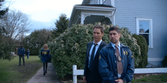 Grant MacLaren, Marcy Warton wearing an FBI jacket, Tanner, and a few other FBI personnel
