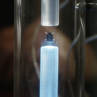 A Traveler comm secured in a tube