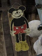 A cardboard Mickey Mouse prop used in the Attic.