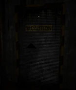 A metal door, formerly used for the Tunnels.