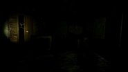 Spirit Dismembered at the left door, flashlight on.