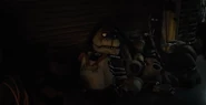 SparkyScreenshot2.png (1.43 MB) Torture Freddy's body seen in the pile of animatronic suits.