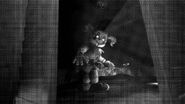 A screenshot from ingame of Circus Baby in the FNaF 4 bedroom found in the source code after the original teaser's upload.