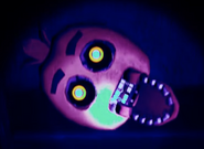 Chica's head as seen in Ennard's Vent Repair level.