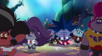 A crowd of Rock Trolls, including Demo