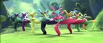 Poppy, Branch and other Pop Trolls dancing with their hair in Trolls World Tour.