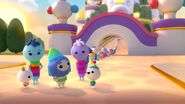 The Rainbow Kingdom citizens line up outside the Rainbow Castle for Royal Request Day.
