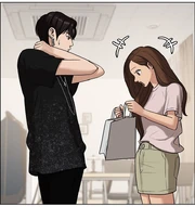 Seojun hands Jugyeong the dress he bought her.