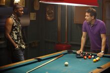 Lafayette and Jesus playing a game of Pool