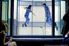 Pam and Eric levitate.