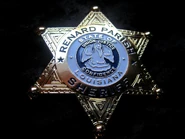 An alternate view of the Renard Parish Sheriff's badge.