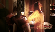 Antonia being unbound from Marnie.