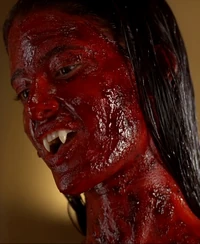 Lilith manifesting herself covered with blood.