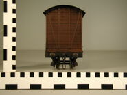 Eighth series ruler reference of a reddish-brown van (large scale)