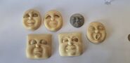 Some resin casts of Alfie's faces as owned by Sean Hedges-Quinn