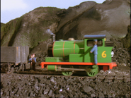 Some trucks being pushed into a mine