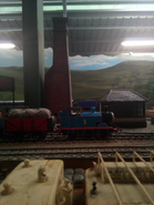 Thomas' model on display at Drayton Manor Theme Park, static in a siding