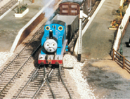 Thomas speeding into the station