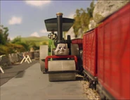 (Note: A workman figure on the left of the screen which has fallen onto the stone wall can be seen and George's face is crooked)