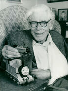 The Reverend holding Thomas Mk3 alongside his television prop