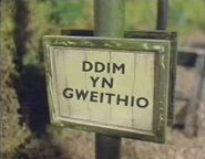 "Out of Order" sign is translated to Welsh