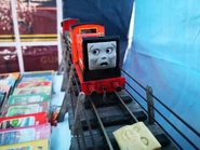 Rusty's unused fourth series horrified face used on a replica made by Twitter user RailwaySkarloey alongside a prototype face at the Halloween Clearwater Event (1994, 2021)