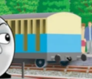 A blue and cream coach