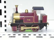 (Note: the block used for the Magic Railroad green screen shoot remains under her chassis.)[6]