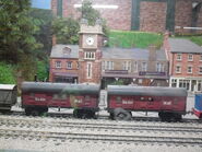 Two resin mail vans on display at Drayton Manor Theme Park