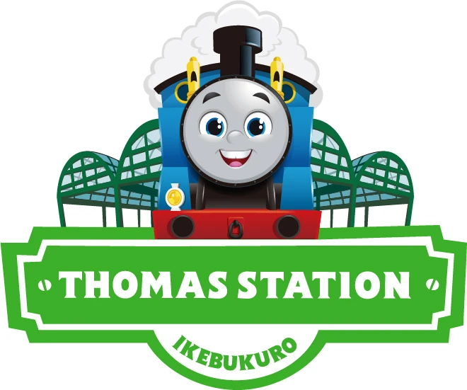 Thomas the Tank Engine with a soft smile on train tracks in a foggy