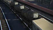 Tankers with the same face design as the slate trucks (standard gauge) in Journey Beyond Sodor