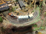 Duke with a saloon coach and one of the blue vans