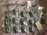 Some of the Horrid Lorries' faces in storage bags previously owned by a private collector