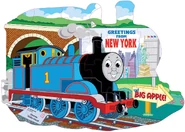 Ravensburger puzzle depicting Thomas traveling to New York City