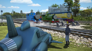 Thomas, Percy and Rebecca admiring the road plane