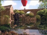 The Hot Air Balloon floating past the Watermill