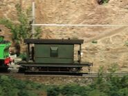 A green brake van at the Hara Model Railway Museum