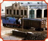 Edward pushing a utility van