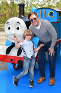 Rufus Jones with his nephew at The Great Race Premiere in King's Cross