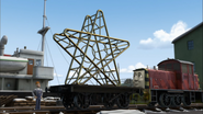 A short flatbed carrying The Star of Knapford