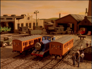A Dyson lorry beside Thomas, Annie and Clarabel