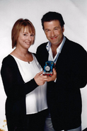 Britt Allcroft with Alec Baldwin and the Thomas model