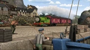 Percy pulling the mail train through the fishing village