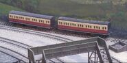 Two red express coaches at Drayton Manor