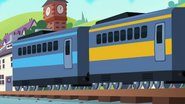 A blue striped coach and a yellow striped coach