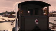Two monkeys riding a brake van