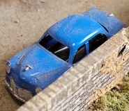 A blue saloon on the Rev. W. Awdry's layout