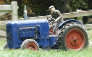 The Tractor's small scale model on display at Drayton Manor Resort driven by Farmer Finney