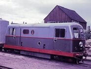 In her original two-tone grey livery